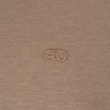 Load image into Gallery viewer, Close-up of a brown fabric with a logo on a matching brown background
