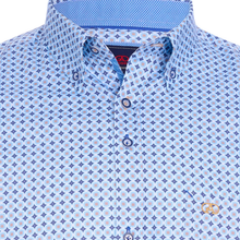 Load image into Gallery viewer, Close-up of a patterned shirt with a collar and buttons.
