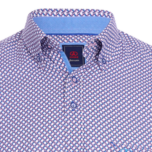 Load image into Gallery viewer, Close-up of a patterned shirt with a brand label on a white background

