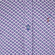 Load image into Gallery viewer, Close-up of a purple shirt with white geometric pattern

