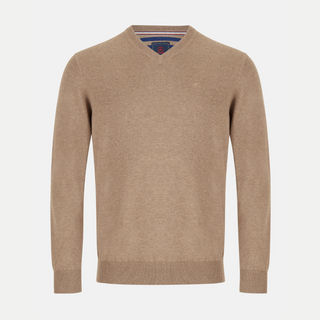 Beige sweater with a brand logo on a light gray background