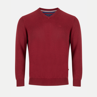 Red sweater on a light gray background