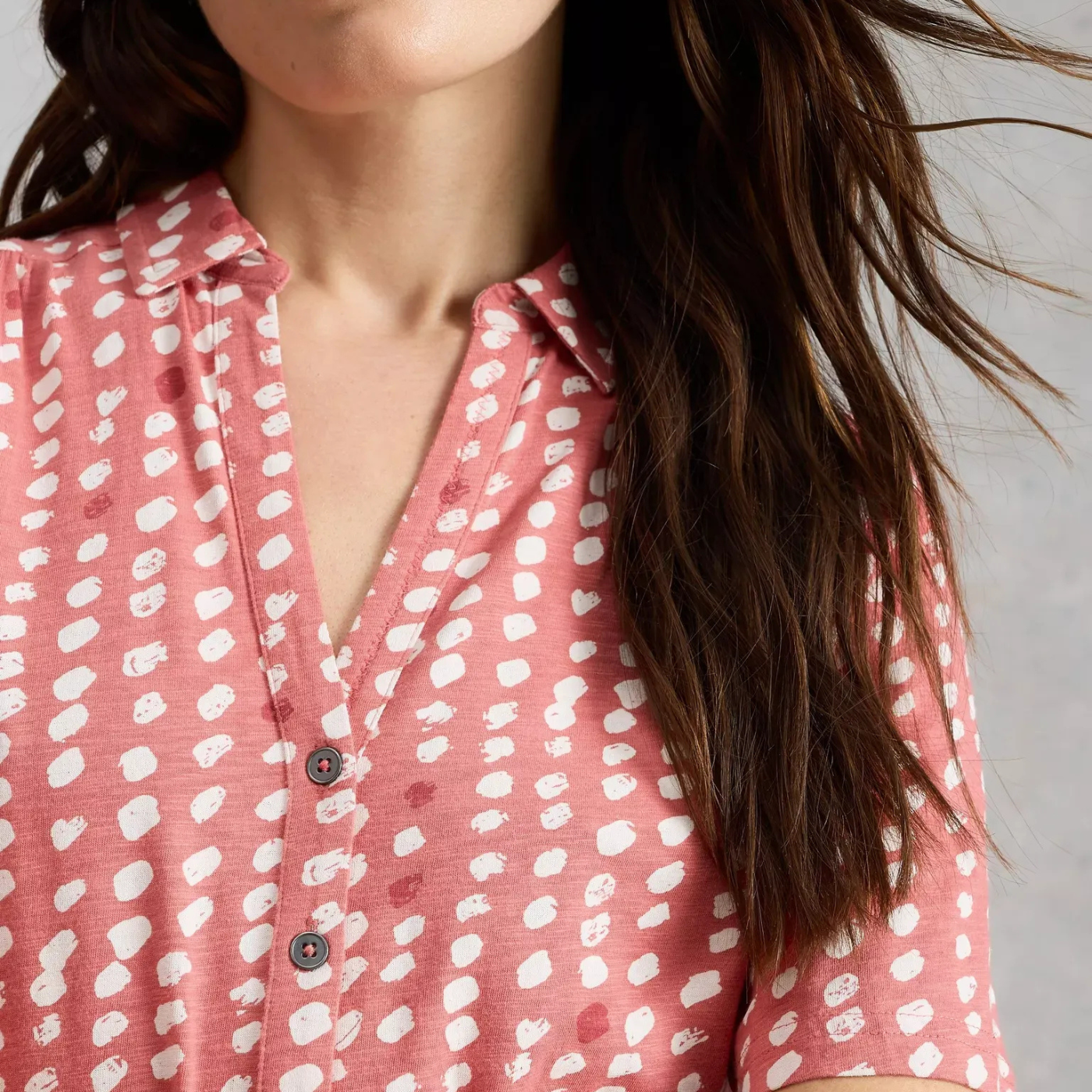 Load image into Gallery viewer, Person wearing a pink shirt with white pattern