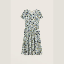 Load image into Gallery viewer, Floral dress on a light beige background
