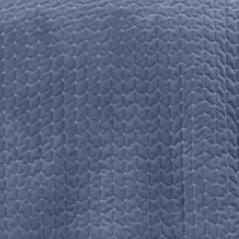 Load image into Gallery viewer, Close-up of a textured blue fabric with a diamond pattern

