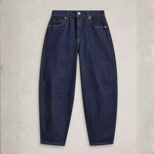 Load image into Gallery viewer, Dark blue denim jeans with a relaxed, tapered leg and silver rivets, laid flat on a textured light gray background.
