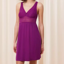 Load image into Gallery viewer, A model wearing the Triumph Aura Spotlight Nightdress in Violet showing the front. 
