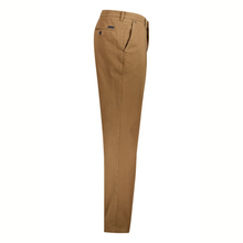 Load image into Gallery viewer, A pair of men's slim-fit chinos in a warm tan brown color, shown from a side profile view against a plain white background.

