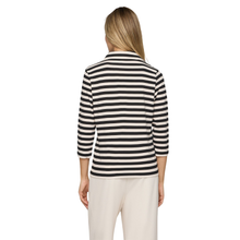 Load image into Gallery viewer, Woman wearing a black and white striped shirt on a white background
