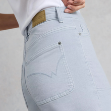 Load image into Gallery viewer, Back view of Model posing, wearing White Stuff Tia Wide Leg Crop Jean, with a  light grey background.
