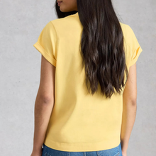 Load image into Gallery viewer, Person wearing a yellow t-shirt with a plain background
