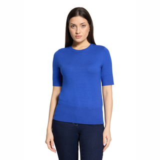Model wearing Betty Barclay Knitted Top in Adria Blue, with a white background.