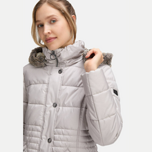 Load image into Gallery viewer, Woman wearing a gray quilted jacket with fur-lined hood on a white background
