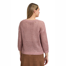 Load image into Gallery viewer, Woman wearing a pink knitted sweater on a white background
