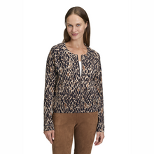 Load image into Gallery viewer, Woman wearing a leopard print top and brown pants on a white background
