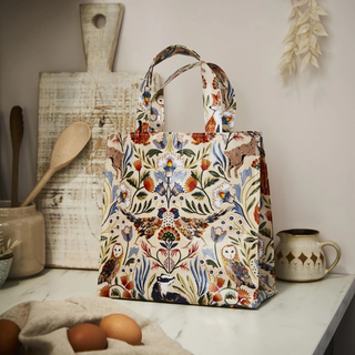 Front view of Blackthorn PVC Shopper Bag Small, in a kitchen.