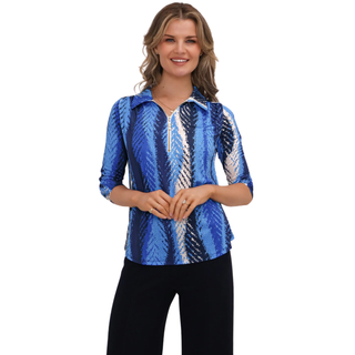 Woman wearing a blue patterned shirt on a white background