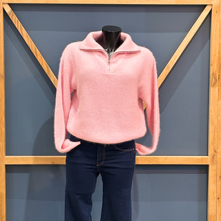 Image of Twins The Label Breckenridge set up on a mannequin, in Baby Pink, with blue and brown wooden background.