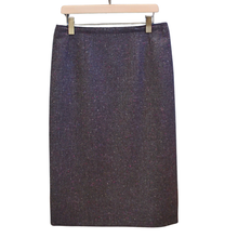 Load image into Gallery viewer, Dark denim skirt on a hanger against a white background
