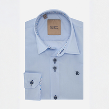 Load image into Gallery viewer, Light blue dress shirt with floral trim on collar and buttons, displayed against a white background.
