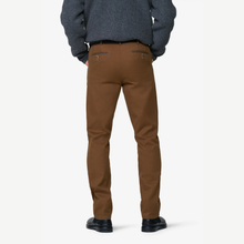 Load image into Gallery viewer, A person shown from the back wearing slim brown trousers, a dark gray sweater, and black shoes against a clean white studio background.
