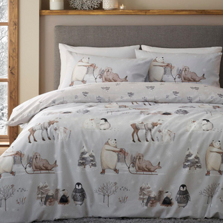 Catherine Lansfield Winter Animals Duvet Set featuring gorgeous images of winter animals playing in the snow and ice