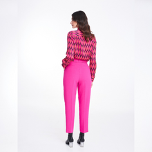 Load image into Gallery viewer, A model facing to the back while wearing the Badoo Hot Pink Belted Trouser. 
