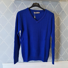 Load image into Gallery viewer, Blue jumper on hanger on bright background 
