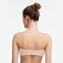Load image into Gallery viewer, A model showing the back details of the Chantelle Norah Strapless Convertible Bra. 
