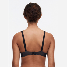 Load image into Gallery viewer, A model showing the back details of the Chantelle True Lace Plunge Spacer Bra.
