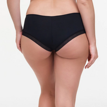 Load image into Gallery viewer, A model showing the back of the Chantelle True Lace Shorty.

