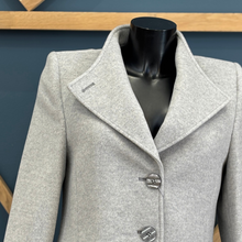 Load image into Gallery viewer, Gray coat on a mannequin against a blue wall
