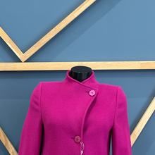 Load image into Gallery viewer, Purple coat on a mannequin against a blue geometric background
