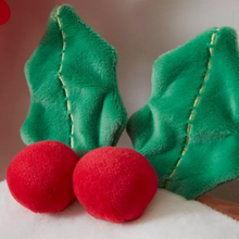 Load image into Gallery viewer, closeup of holly on cushion
