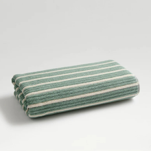 Load image into Gallery viewer, Folded green and white striped towel on a light gray background
