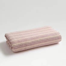 Load image into Gallery viewer, Folded textured towel with a subtle pattern on a light gray background
