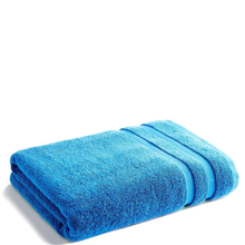 Load image into Gallery viewer, Folded blue towel on a white background
