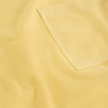 Load image into Gallery viewer, Close-up of a yellow fabric with a pocket
