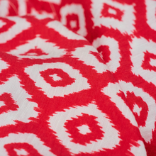 Load image into Gallery viewer, Close up of Red and white patterned shirt 
