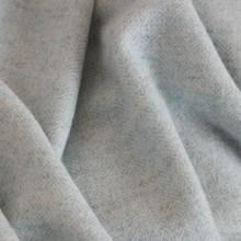 Load image into Gallery viewer, Close-up of textured gray fabric with folds
