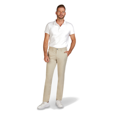 Load image into Gallery viewer, Man wearing a white polo shirt and beige pants on a white background
