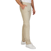 Load image into Gallery viewer, Beige pants worn by a person on a white background
