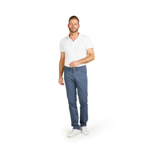 Load image into Gallery viewer, Man wearing a white shirt and blue jeans on a white background
