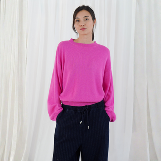 Lady in Pink Sweater on White background