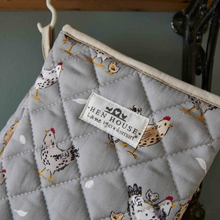Load image into Gallery viewer, Quilted gauntlet with chicken pattern and &#39;Hen House Lane&#39; label on a neutral background
