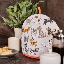 Load image into Gallery viewer, Tea Cosy with Dog Motif in a Lifestyle shot 
