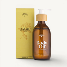 Load image into Gallery viewer, Brown bottle of body oil with a wooden pump and yellow packaging on a white background
