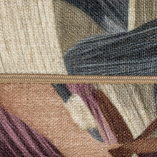 Load image into Gallery viewer, Close-up of a woven textile with a horizontal zipper, showing a multicolor abstract pattern in beige, brown, gray, and muted purple.
