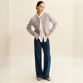 Jacket on model with white blouse underneath and jeans on white background 