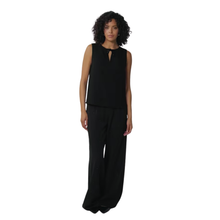 Load image into Gallery viewer, Image of full view of model, wearing the Esqualo Bow Brooch Blouse.
